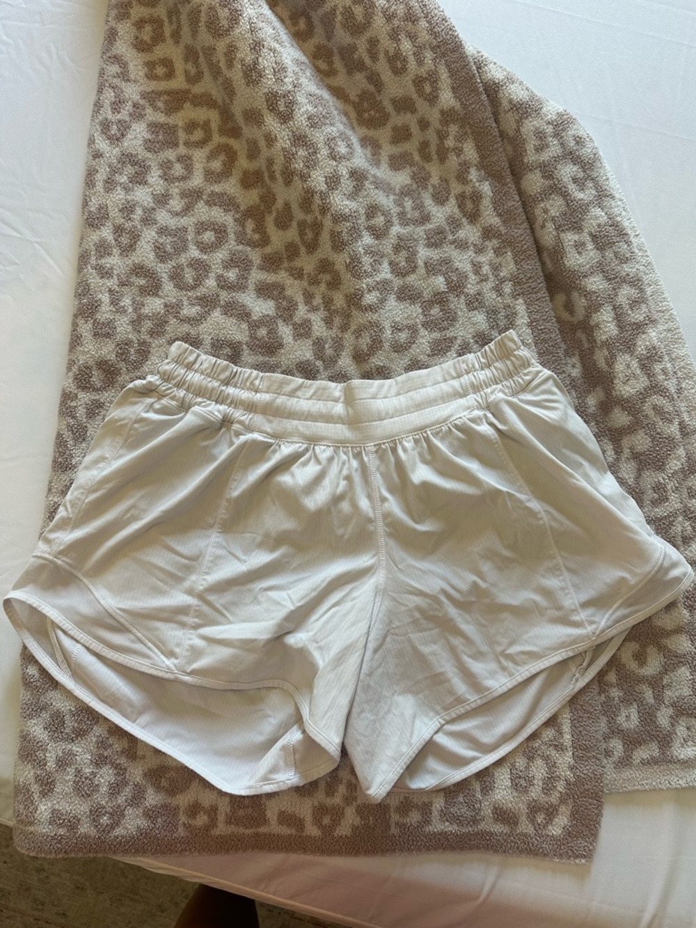 Lululemon White 4” shorts Size 8